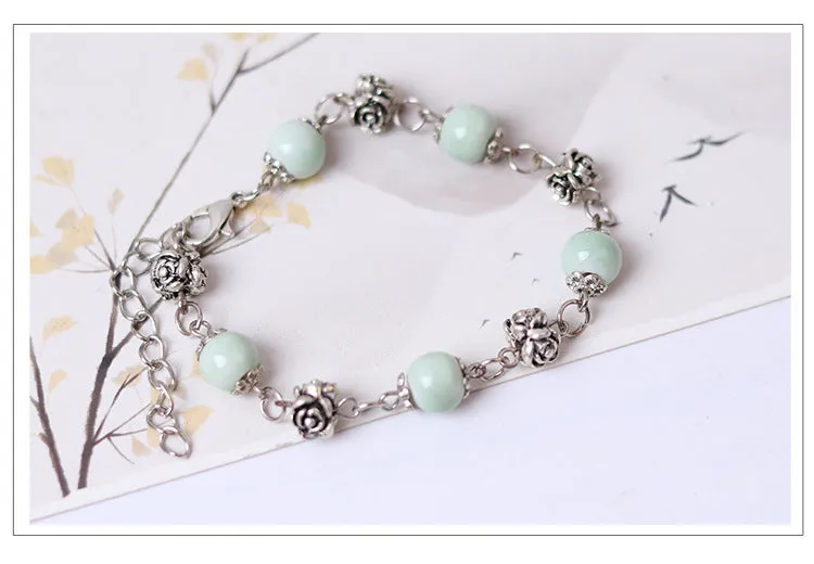 Fashionable and simple bohemian porcelain bead bracelet, alloy rose collocation, exquisitely hand-woven