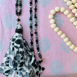 long beaded chain tassel necklace: black w/ leopard bead