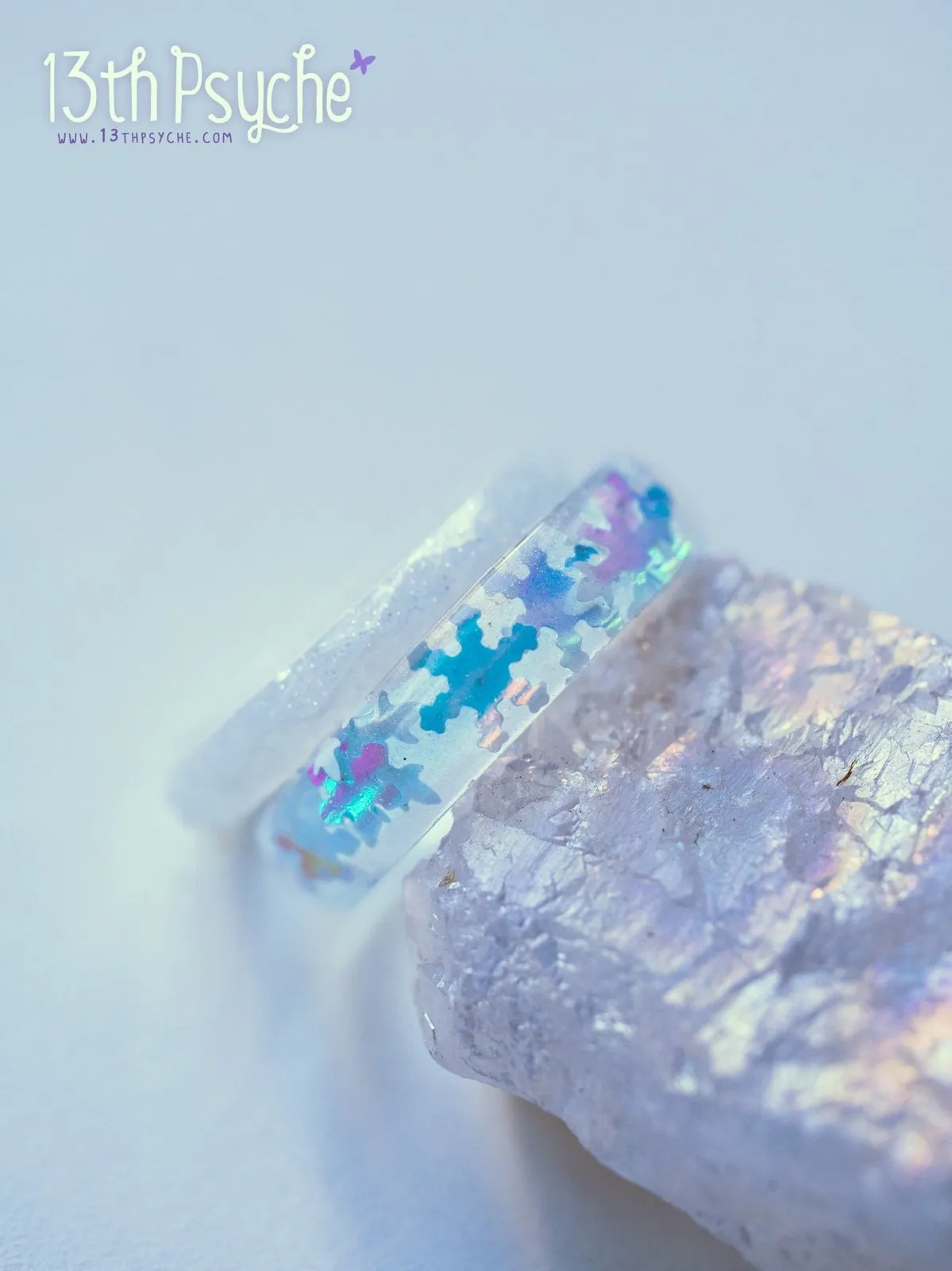 Winter inspired snowflake and white glitter resin ring set of two