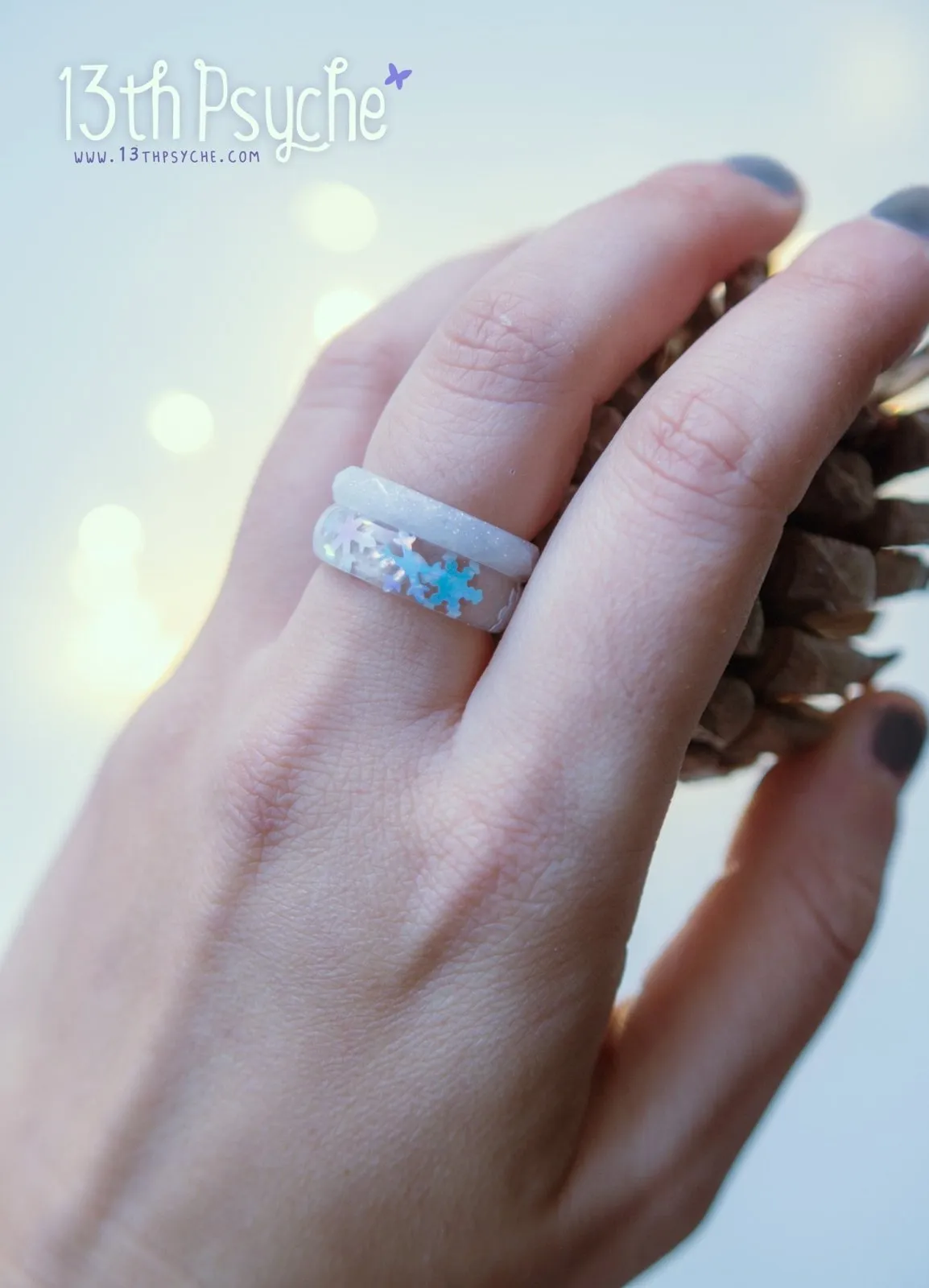 Winter inspired snowflake and white glitter resin ring set of two